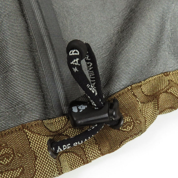 COACH 
Felpa con cappuccio A BATHING APE 
Giacca a vento con cappuccio con logo distintivo in collaborazione con A BATHING APE