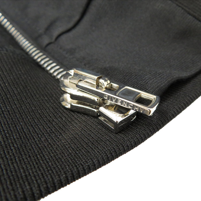 GIVENCHY 
Veste à fermeture éclair avec lignes latérales, col montant, doublure en polaire, polyester 
Veste de sport avec bande à logo