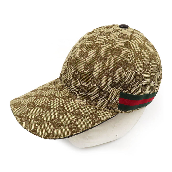GUCCI 
Toile à motif intégral 
Casquette de baseball en toile GG avec bande Sherley