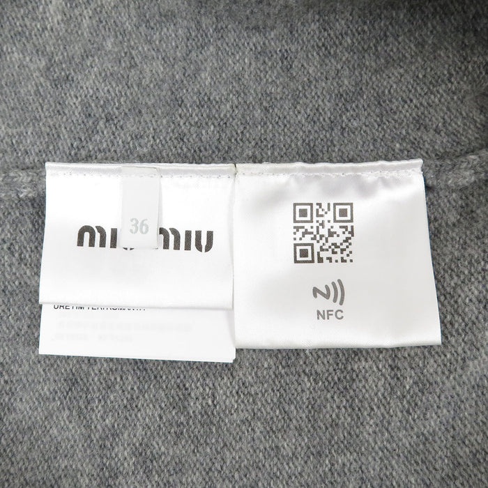 MIUMIU  
针织剪裁处女羊毛  
背部标志短款毛衣