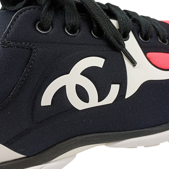 CHANEL 
COCO CC Logo Lace-Up 
Coco Mark Fabric Sneakers