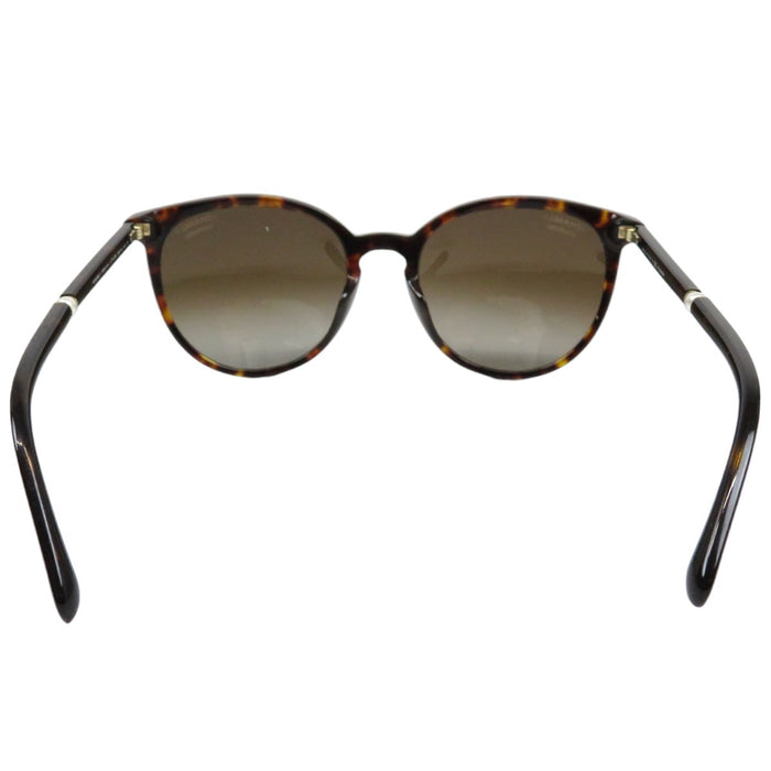CHANEL  
COCO CC motif écaille de tortue Wellington  
Lunettes de soleil logo perles fantaisie