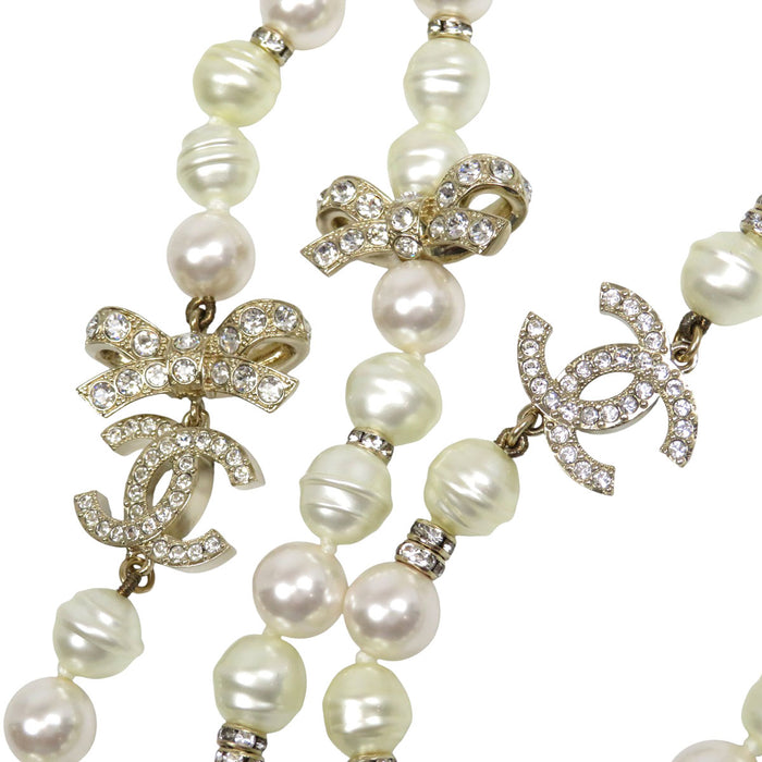 CHANEL  
COCO CC Logo Rhinestone Gold Color Metal B23S  
Coco Mark Costume Pearl Long Necklace