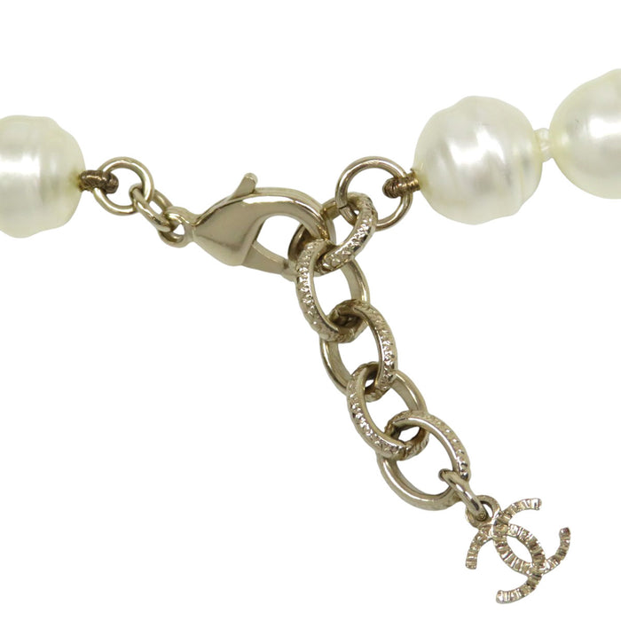 CHANEL  
COCO CC Logo Rhinestone Gold Color Metal B23S  
Coco Mark Costume Pearl Long Necklace