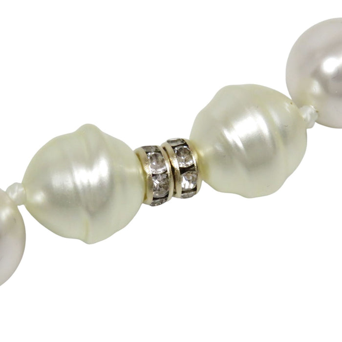 CHANEL  
COCO CC Logo Rhinestone Gold Color Metal B23S  
Coco Mark Costume Pearl Long Necklace