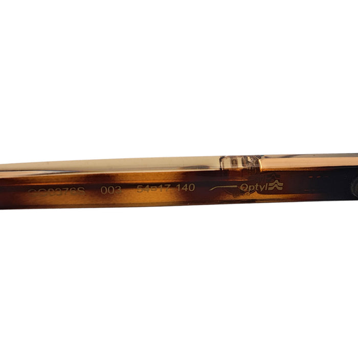GUCCI  
GG Double G Wellington  
Lunettes de soleil à motif écaille avec G entrelacés