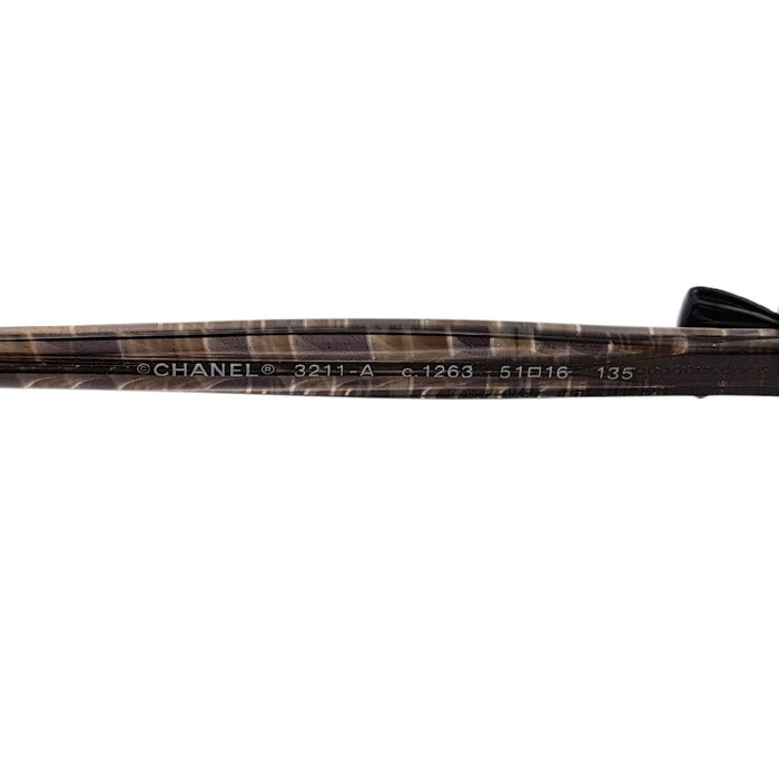 CHANEL  
COCO CC Logo Glasses Silver Color Metal  
Coco Mark Ribbon Eyewear