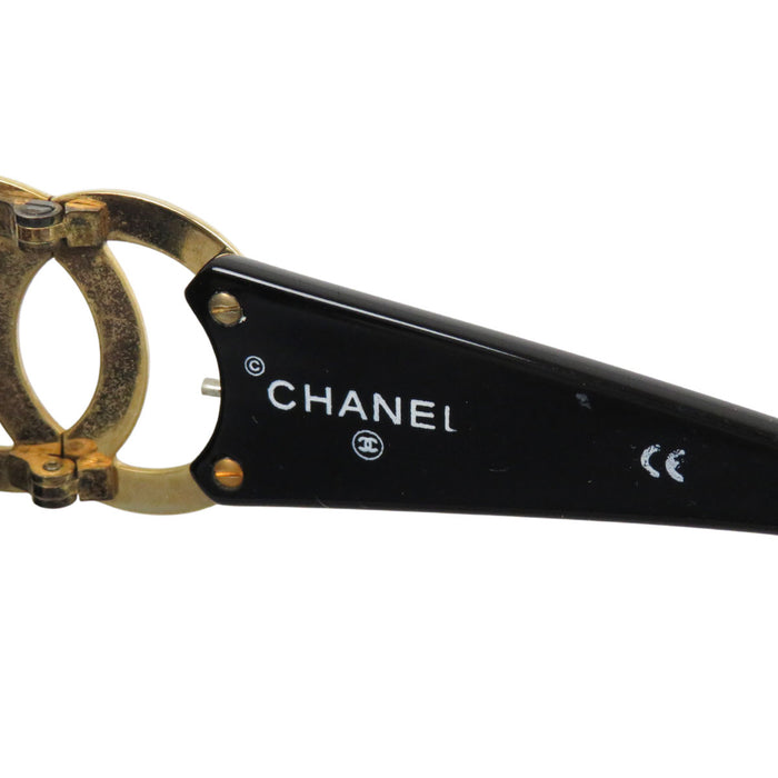 CHANEL 
COCO CC Logo Eyewear Gold-Colored Metal 
Coco Mark Sunglasses