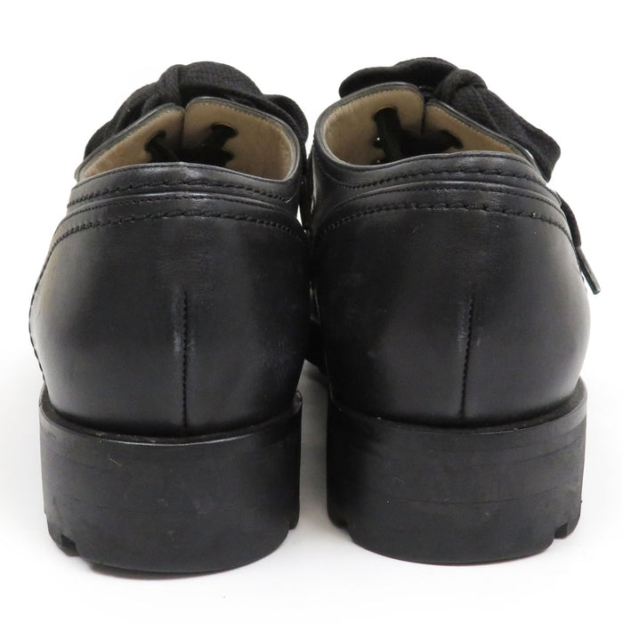 CHANEL 
COCO CC logo cuir à lacets 
Chaussures derby bout golf vintage avec marque Coco