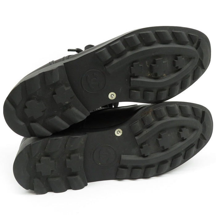 CHANEL 
COCO CC logo cuir à lacets 
Chaussures derby bout golf vintage avec marque Coco