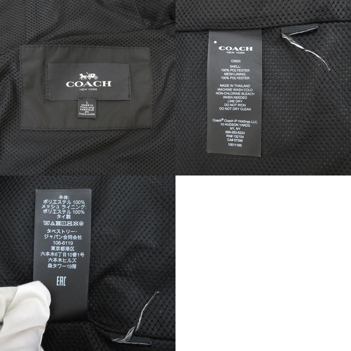 COACH 
Écusson logo 
Coupe-vent signature