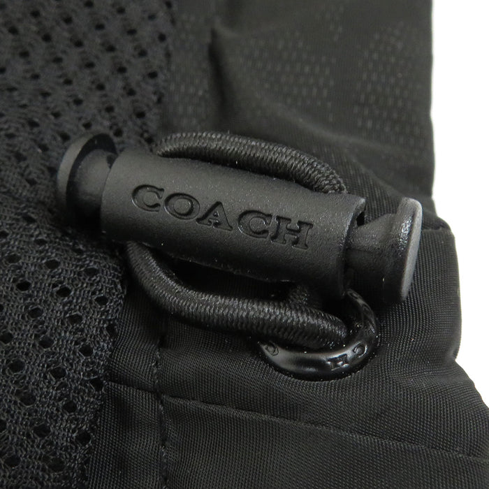 COACH 
Écusson logo 
Coupe-vent signature