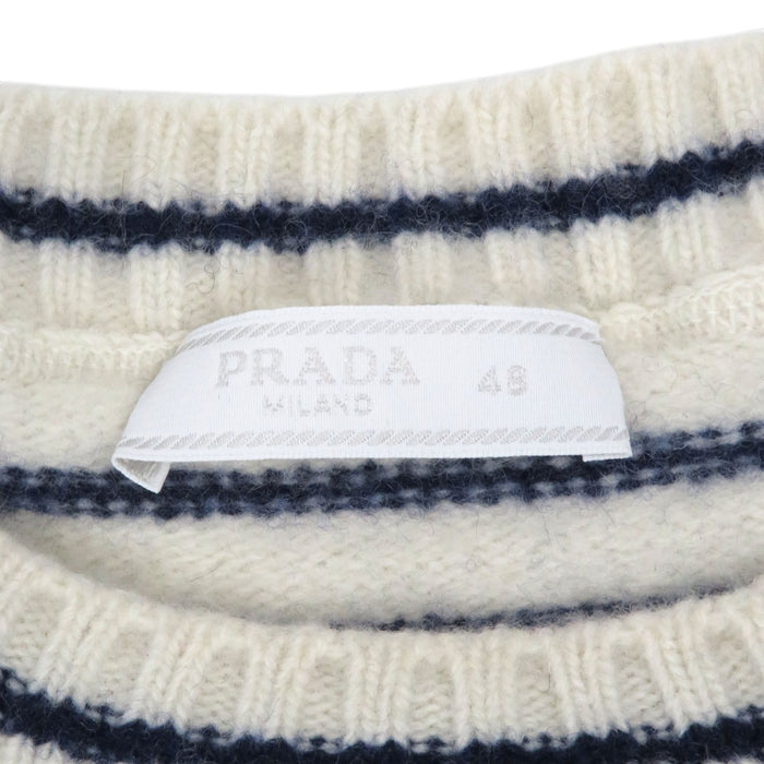 PRADA  
Mélange laine et cachemire  
Pull rayé à logo