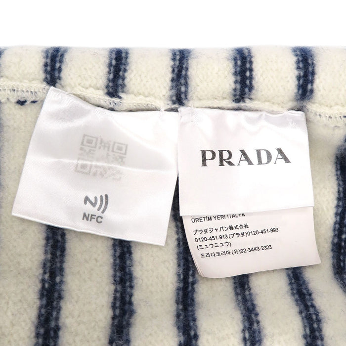 PRADA  
Mélange laine et cachemire  
Pull rayé à logo