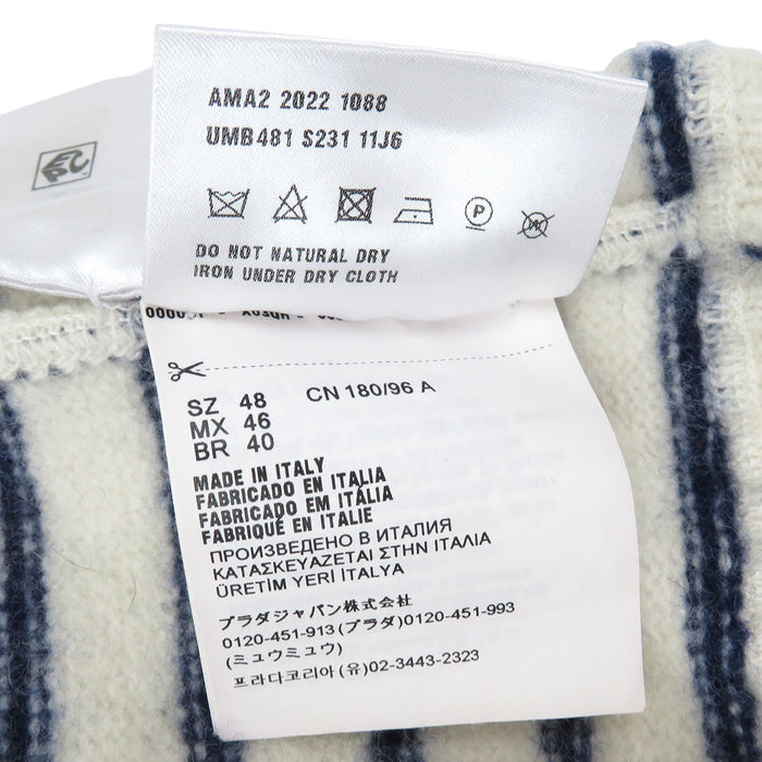 PRADA  
Mélange laine et cachemire  
Pull rayé à logo