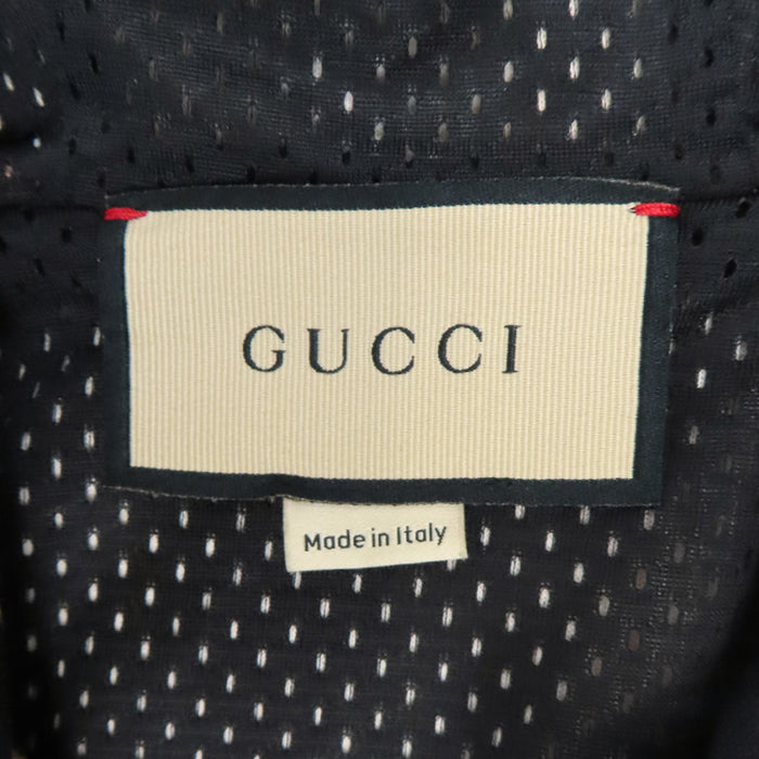 GUCCI 
Sweat en maille à motif étoile et logo GG 
Sweat à capuche demi-fermeture éclair étoile