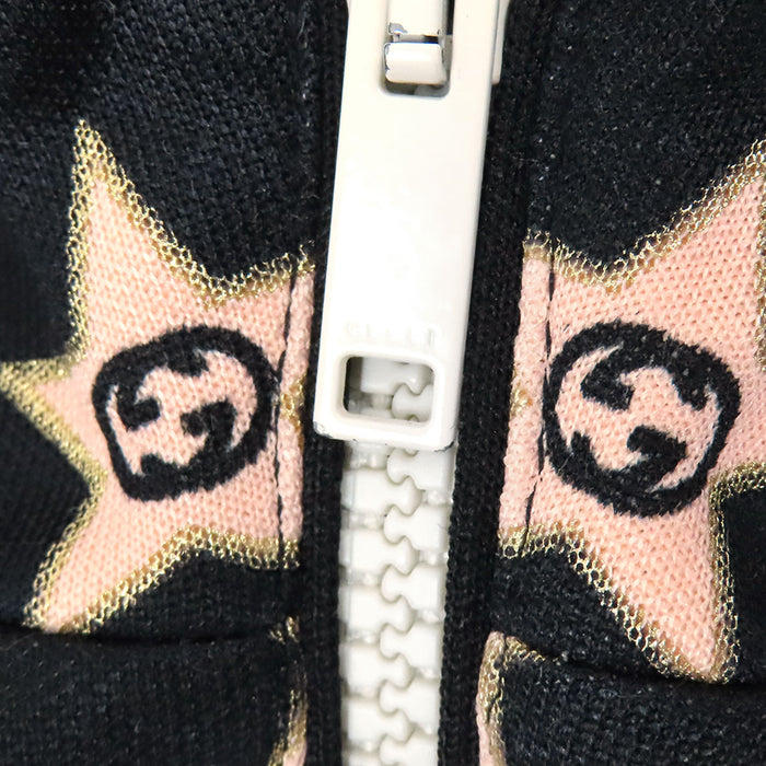 GUCCI 
Sweat en maille à motif étoile et logo GG 
Sweat à capuche demi-fermeture éclair étoile