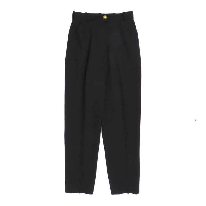 CHANEL  
COCO CC Bouton Coco Pantalon fuselé en laine  
Pantalon à plis centraux avec logo Coco