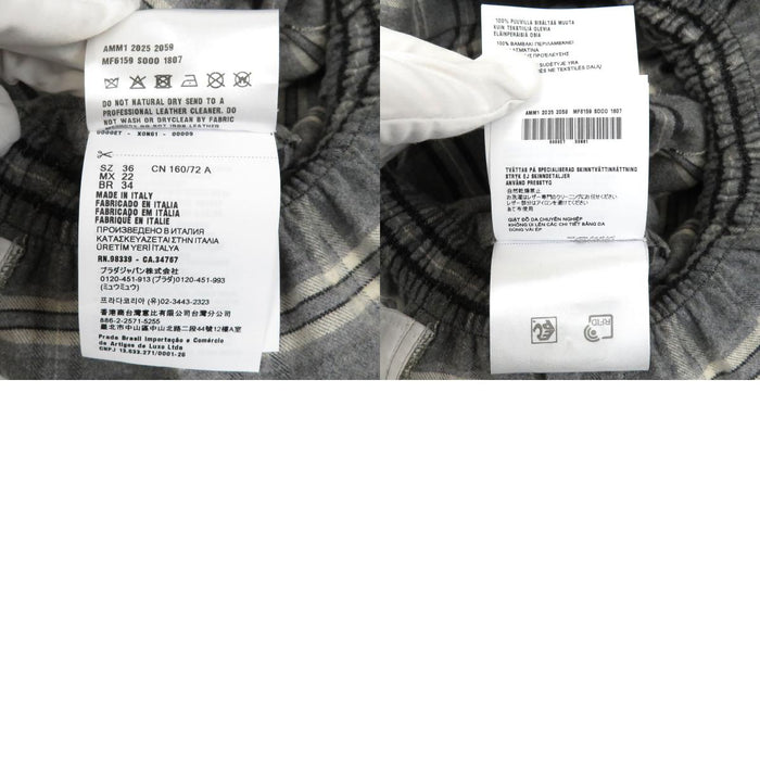 MIUMIU  
Robe chemise à carreaux avec logo 25-26AW, mini en velours côtelé, coton flanelle