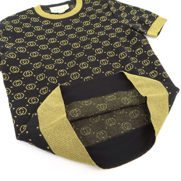 GUCCI  
Logo motif intégral  
Pull à manches courtes GG pailleté