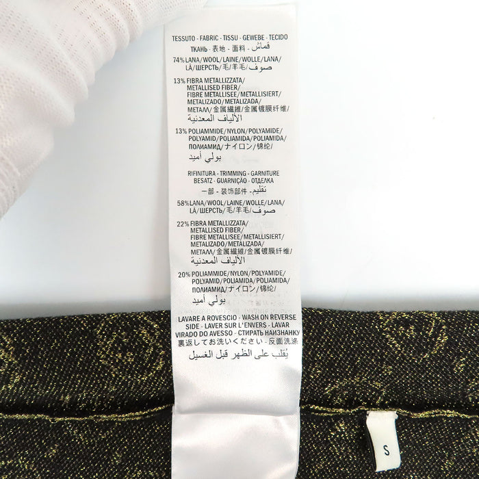 GUCCI  
Logo motif intégral  
Pull à manches courtes GG pailleté