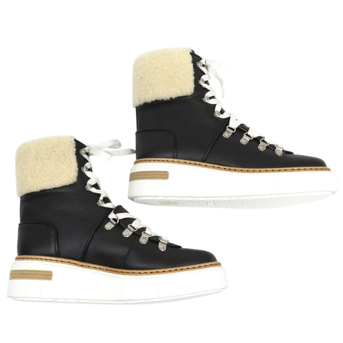 HERMES  
Lace-Up Leather  
Flocon Mouton Ankle Boots