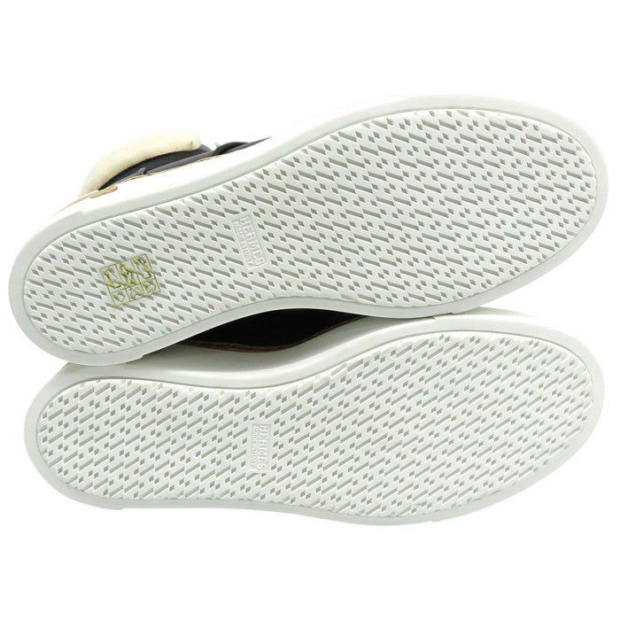 HERMES  
Bottines à lacets en cuir  
Flocon mouton cheville