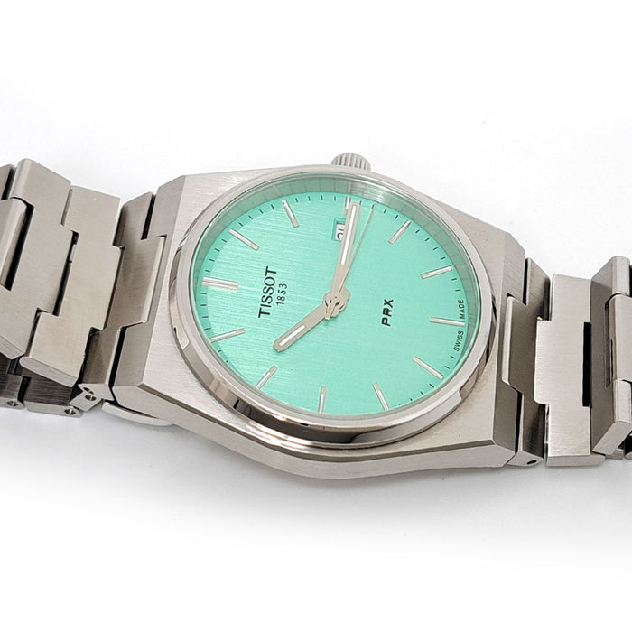 TISSOT 
PRX Light Green 
With box and guarantee