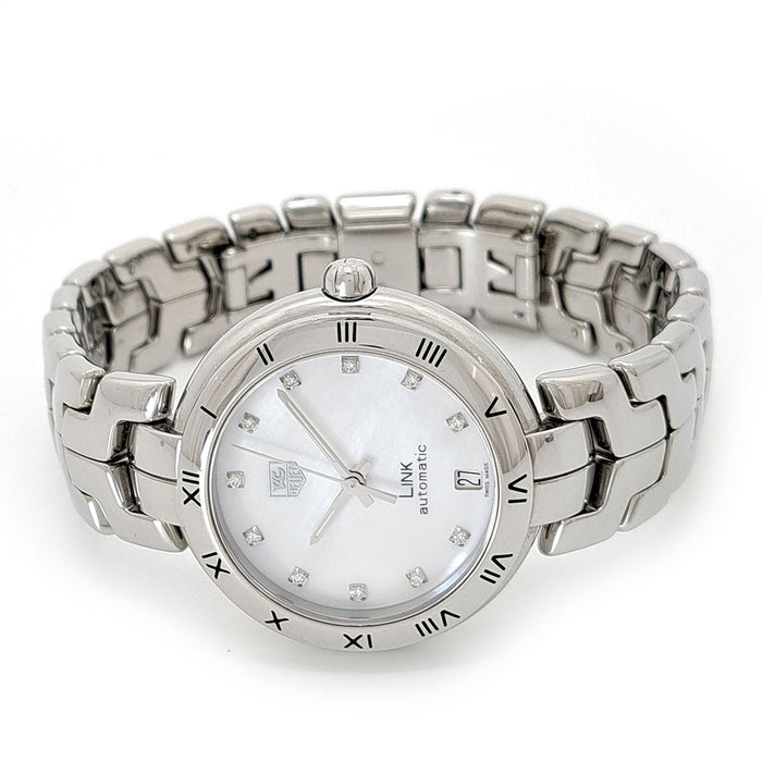TAG HEUER 
Link 
avec boîte et garantie