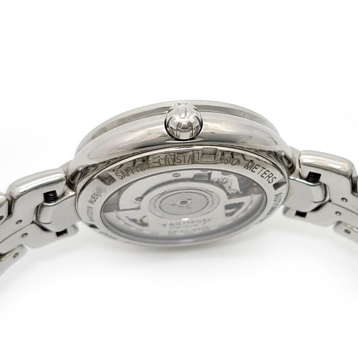 TAG HEUER 
Link 
avec boîte et garantie