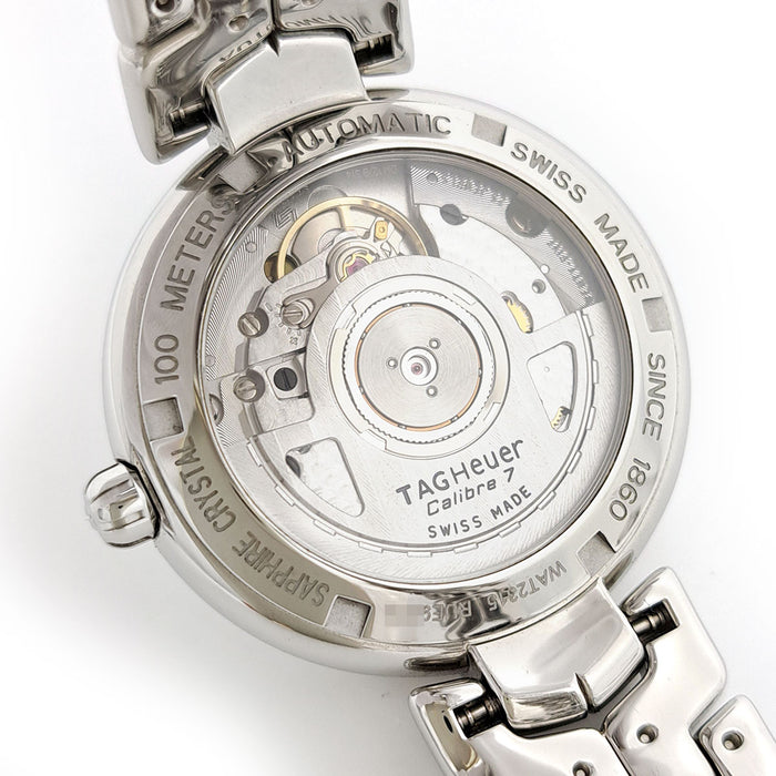 TAG HEUER 
Link 
avec boîte et garantie
