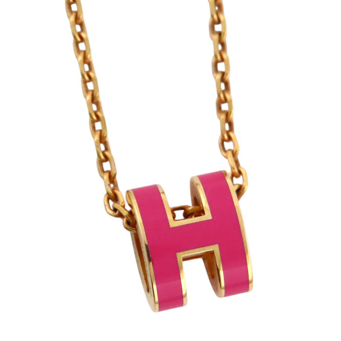 HERMES  
Collier mini Pop Ash H en métal doré avec logo H Ash