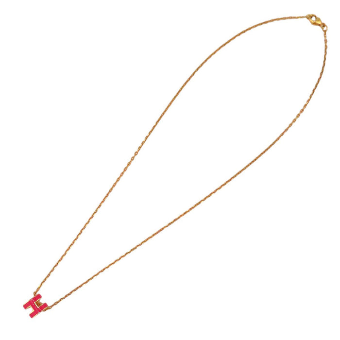 HERMES  
Collier mini Pop Ash H en métal doré avec logo H Ash