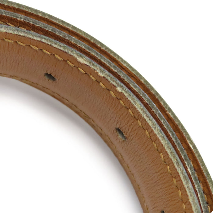 HERMES 
Ceinture en cuir vintage avec métal couleur or et poinçon ◯W