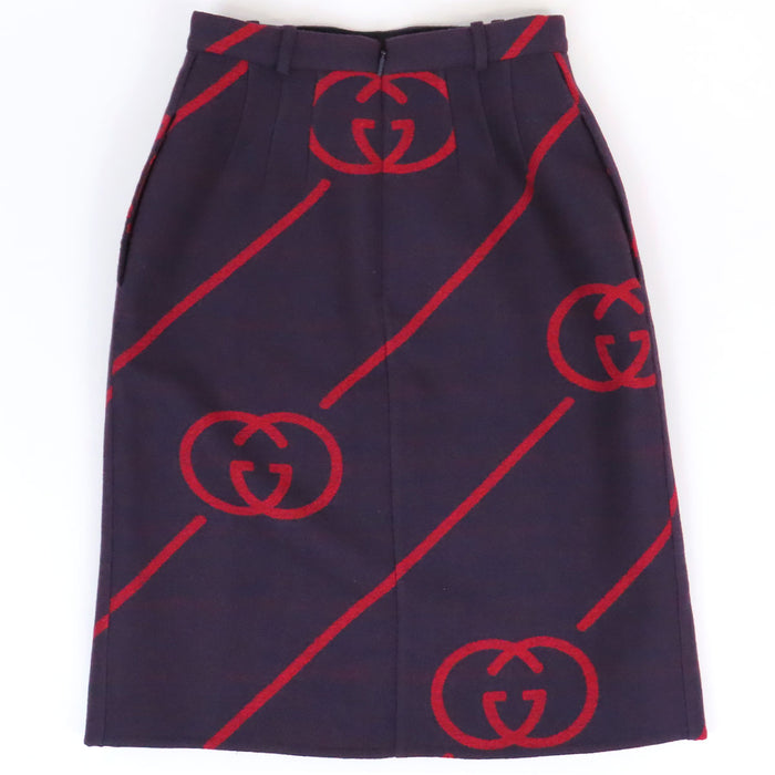 GUCCI 
Jupe en laine rayée fendue avec boutons logo GG 
G interlocking G