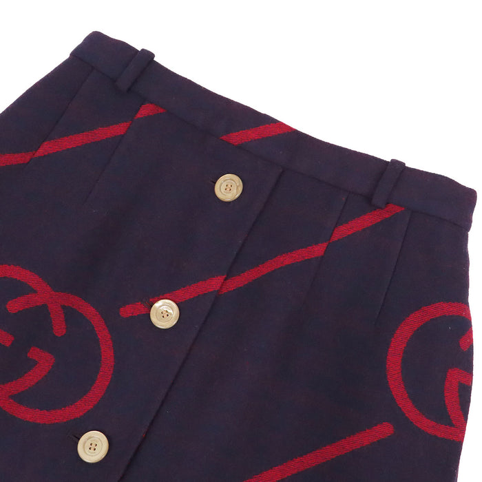GUCCI 
Jupe en laine rayée fendue avec boutons logo GG 
G interlocking G