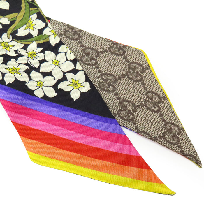 GUCCI 
Foulard logo soie 
Twilly nœud cou GG Flora