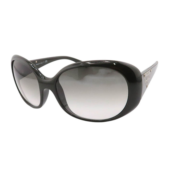 PRADA  
Lunettes  
Lunettes de soleil à branches avec logo triangulaire