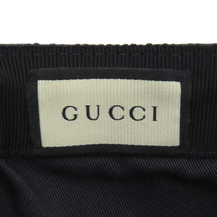 GUCCI 
Casquette avec broderie logo ligne Web Stripe et G entrelacé