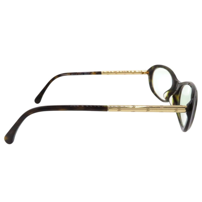 CHANEL 
COCO CC Logo Tortoiseshell Pattern 
Coco Mark Oval Frame Eyewear