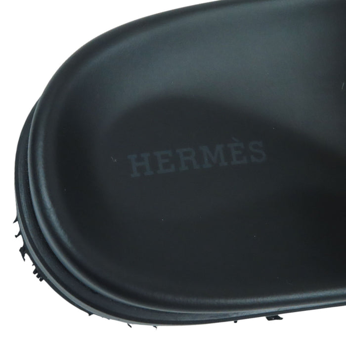 HERMES 
H アッシュ ロゴ フラット 
シプレ スタッズ レザー サンダル