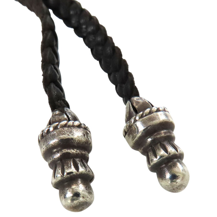 CHROME HEARTS 
CH FILIG CROSS-XSM LB Barillet Boro Chip 
Collier en cuir tressé Croix filigrane SM