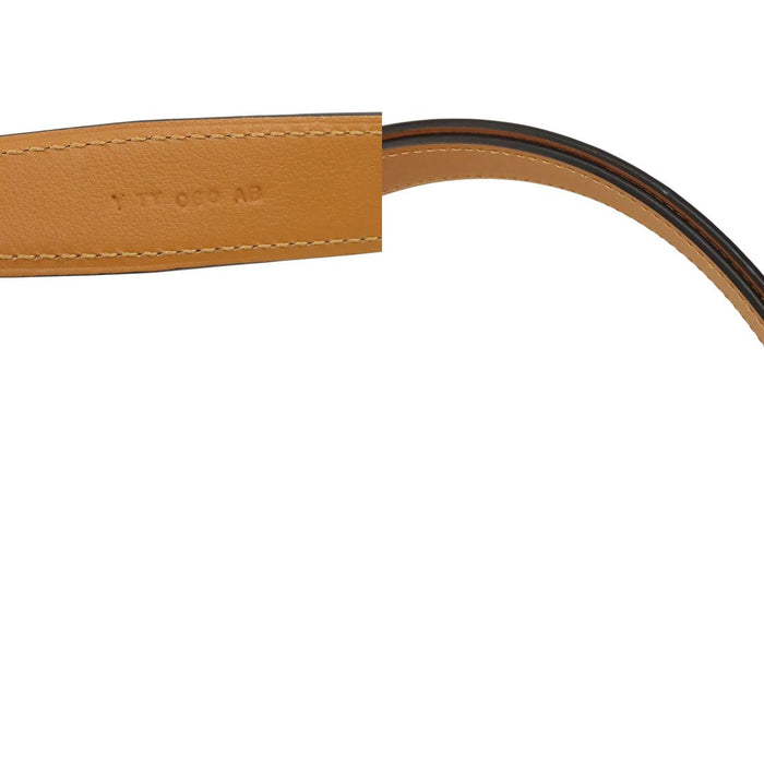 HERMES  
Ceinture en cuir avec métal doré gravé Y  
Mors de cheval