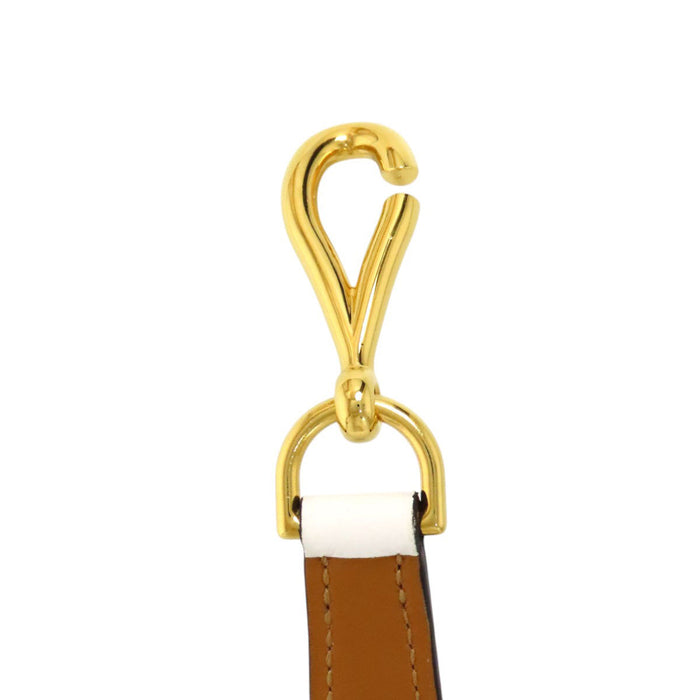 HERMES  
Ceinture en cuir avec métal doré gravé Y  
Mors de cheval