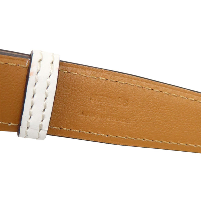 HERMES  
Ceinture en cuir avec métal doré gravé Y  
Mors de cheval