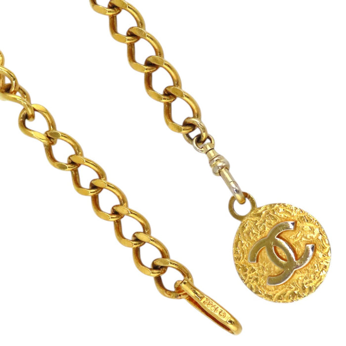 CHANEL  
COCO CC logo 1982 métal couleur or  
Ceinture chaîne vintage avec logo Coco
