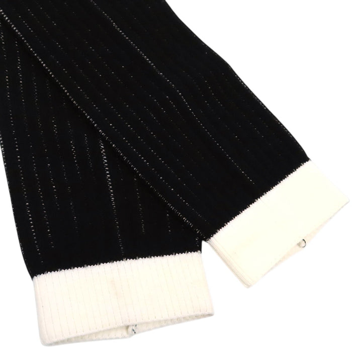 CHANEL  
COCO CC logo pull côtelé  
Chaussettes chauffe-jambes avec logo Coco