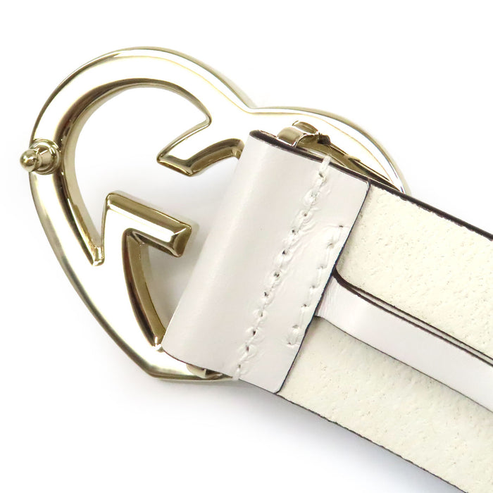GUCCI  
GG Lovely ceinture en cuir avec bouclerie couleur or  
Cœur avec G entrelacés