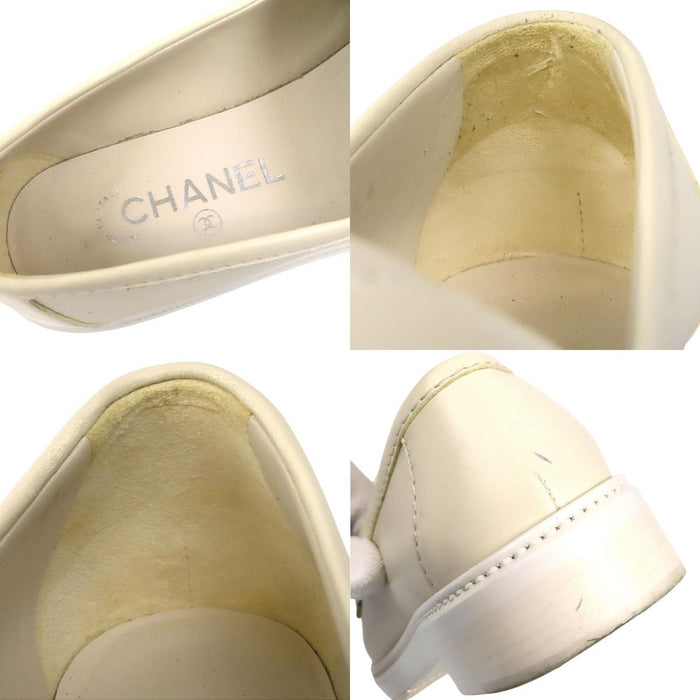 CHANEL  
COCO CC logo matelassé cuir ferrures couleur argent 20B  
Mocassins à boucle tournante avec logo Coco