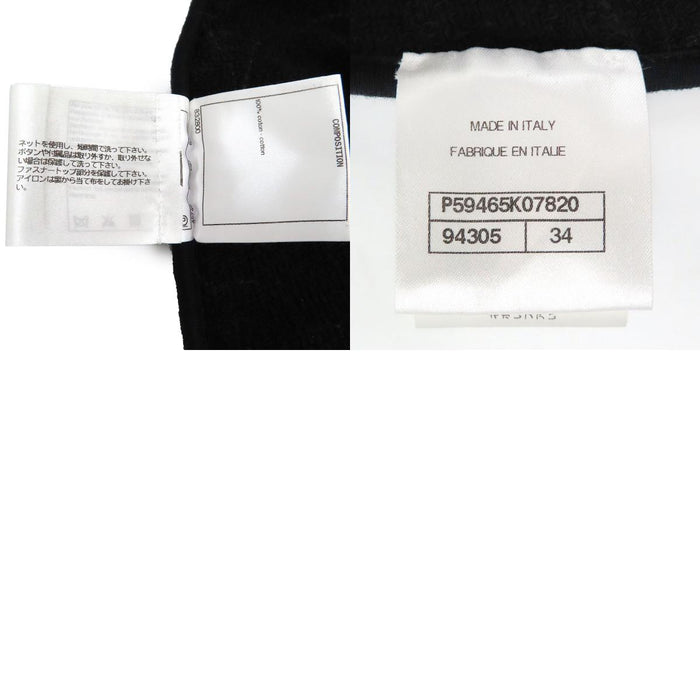 CHANEL  
COCO CC motivo totale bottone Coco  
Felpa con ricamo Camelia e logo Coco